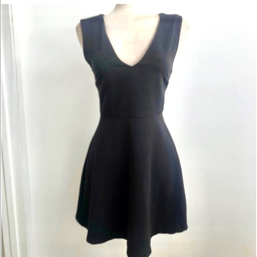 Fit & flare black dress with open/bow back